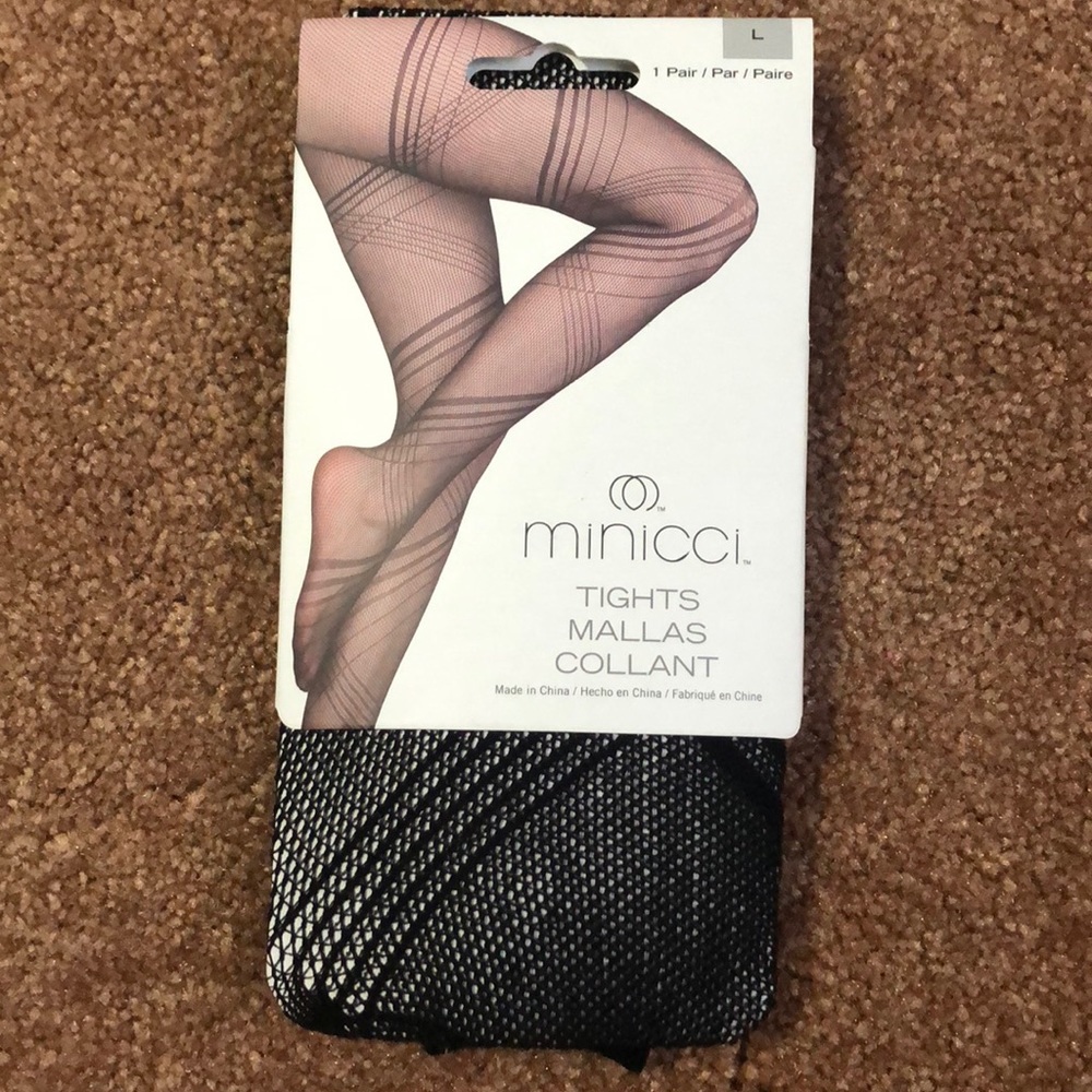 Unworn tights. Still packed. Large size.